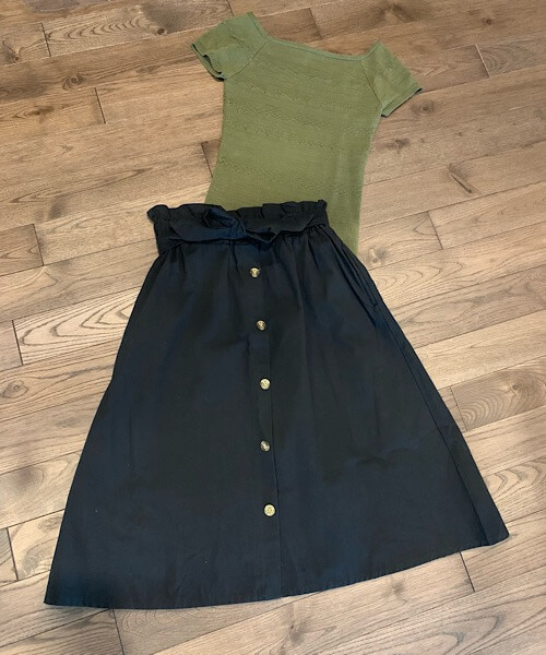 Paperbag Button Skirt shown in black and paired with a green top from Bright-Eyed & Beautiful Fashion Boutique