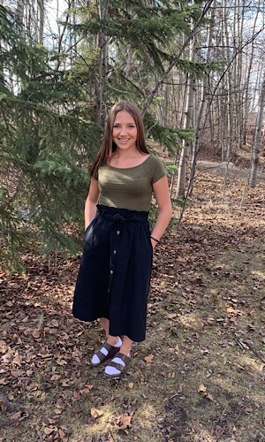 Paperbag Button Skirt shown in black and paired with a green top from Bright-Eyed & Beautiful Fashion Boutique