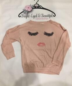 Lips & Lashes Top shown in peach, bright-eyes & beautiful boutique